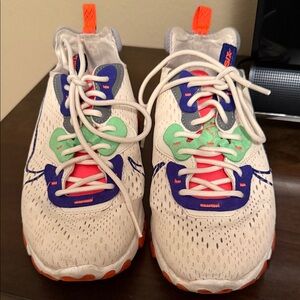 Nike White and Blue Athletic Shoes with Orange Accents